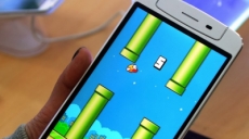 Flappy Bird contra Mario Bros después de pasar 999 tubos.