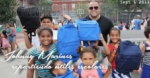 Manager de Romeo Santos reparte Utiles Escolares