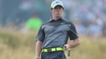McIlroy se destaca en el Abierto Británico; Tiger Woods pasa con apuros.